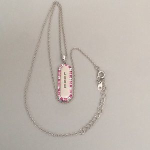 Silver-tone necklace with pink Love charm